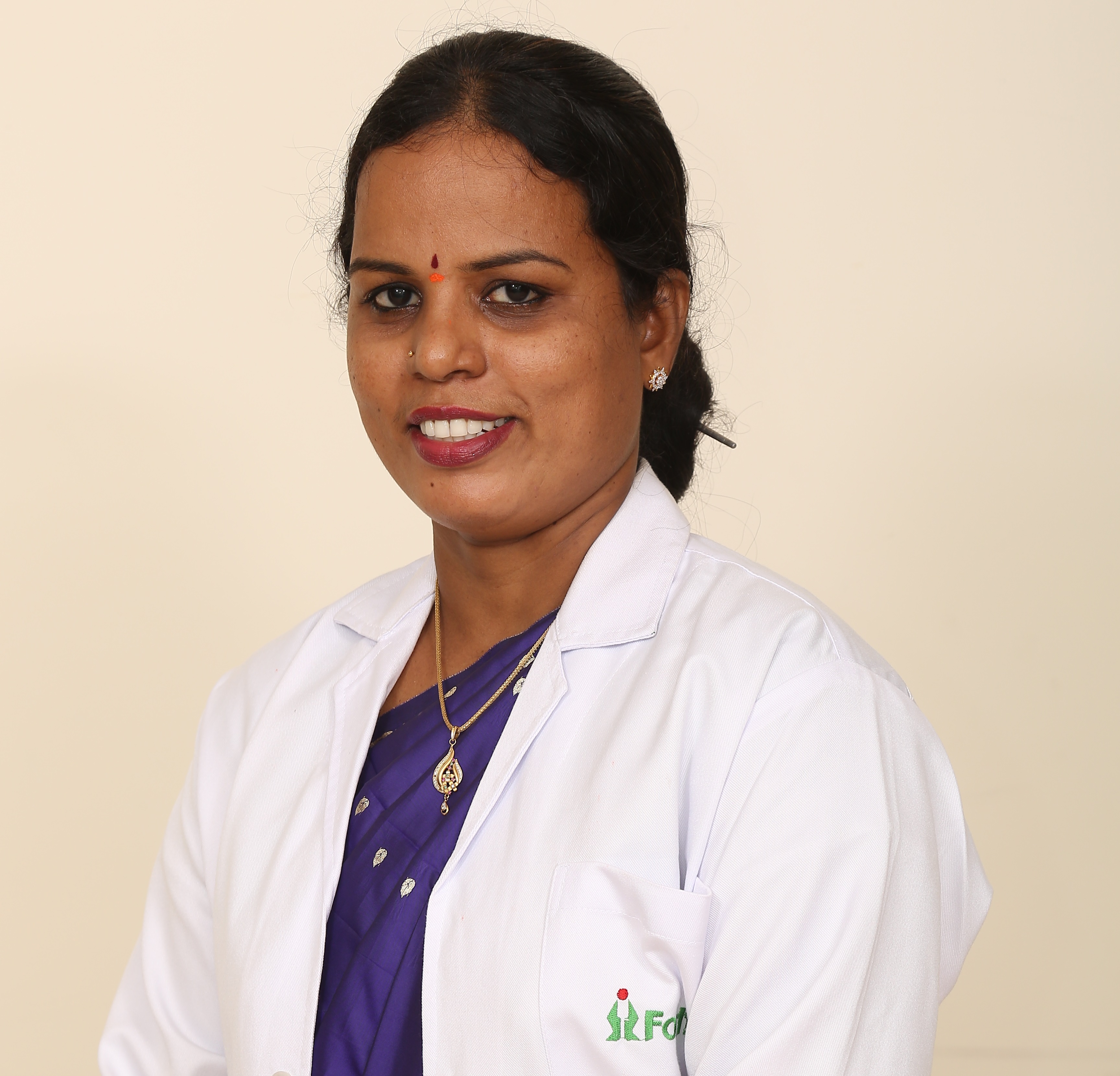 Dr. M Devi